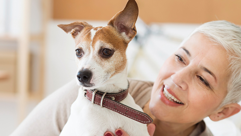 resident with small dog