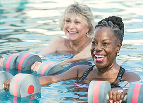 two female residents in pool