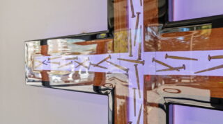 Chapel cross detail inside worship space at Apple Valley Village.