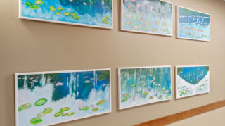 Artwork displayed on wall in Open Circle adult day program at Apple Valley.